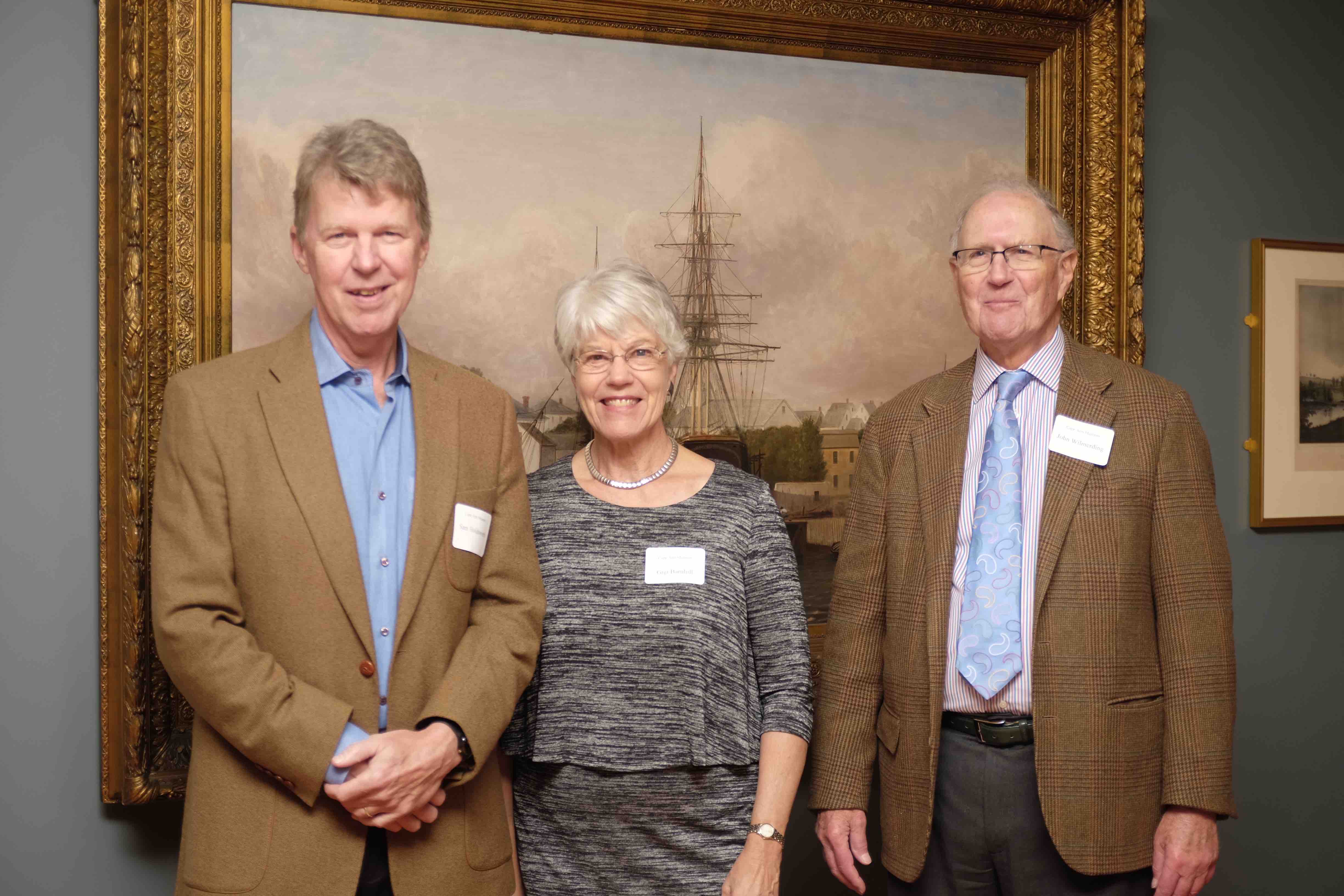 Sam Holdsworth (left) and John Wilmerding (right) standing with Georgia Barnhill 